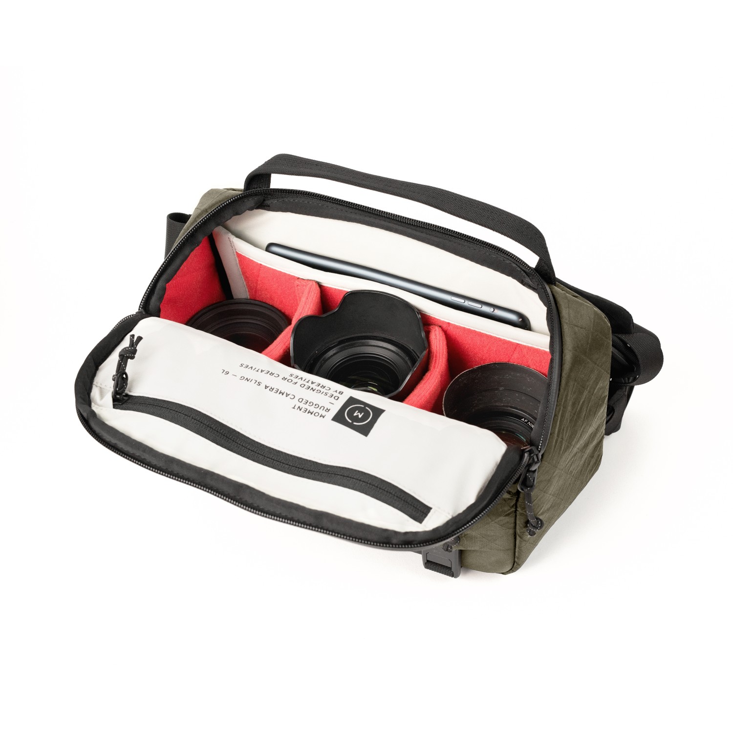 Organized camera gear inside the Moment Rugged 6L sling