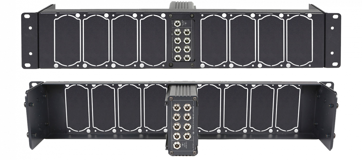 Datavideo RMK-2 from the front and inside, showing the built-in DC distributor and space for eight converters