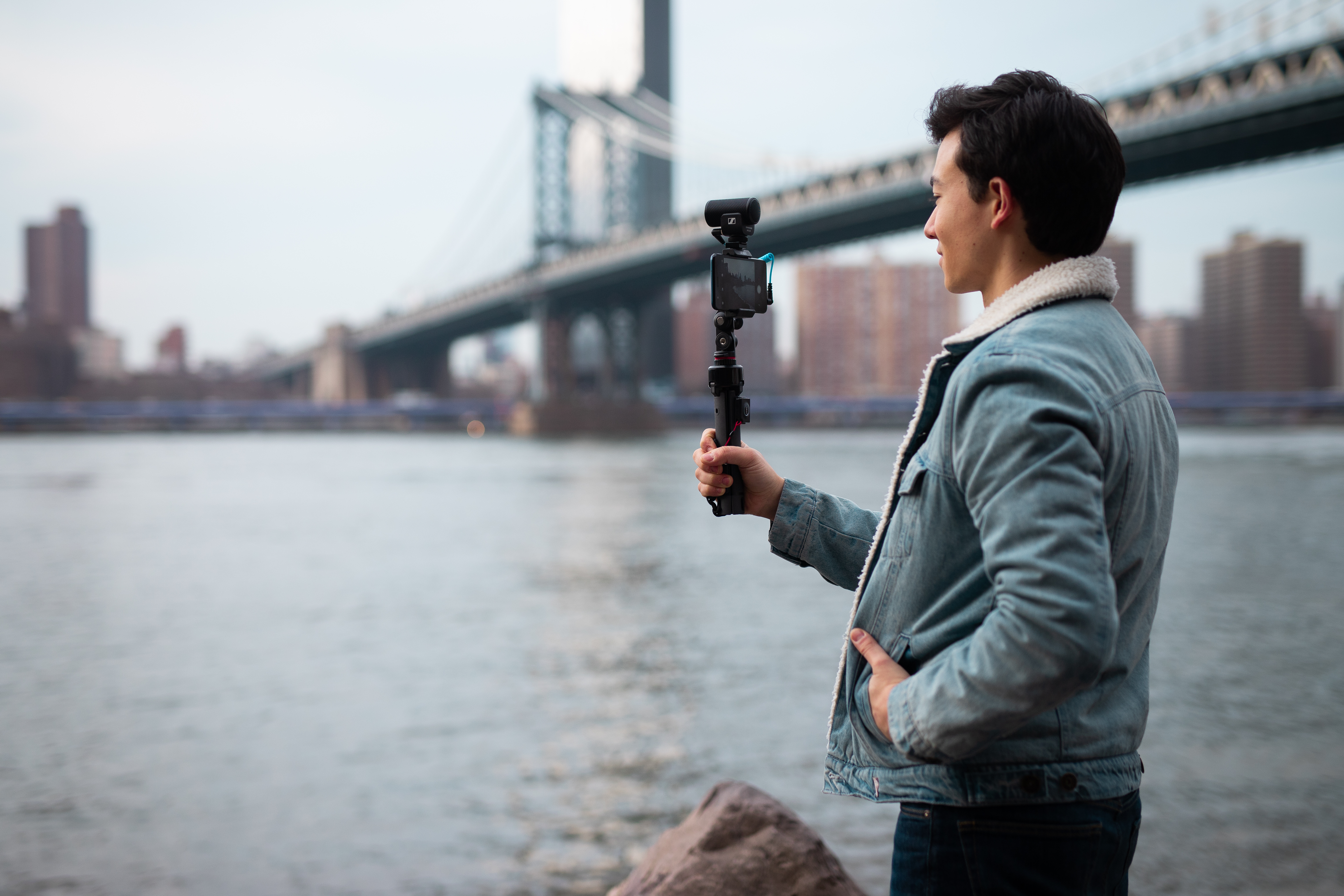 Creator recording with a smartphone mounted in the Sennheiser MKE 200 Mobile Kit