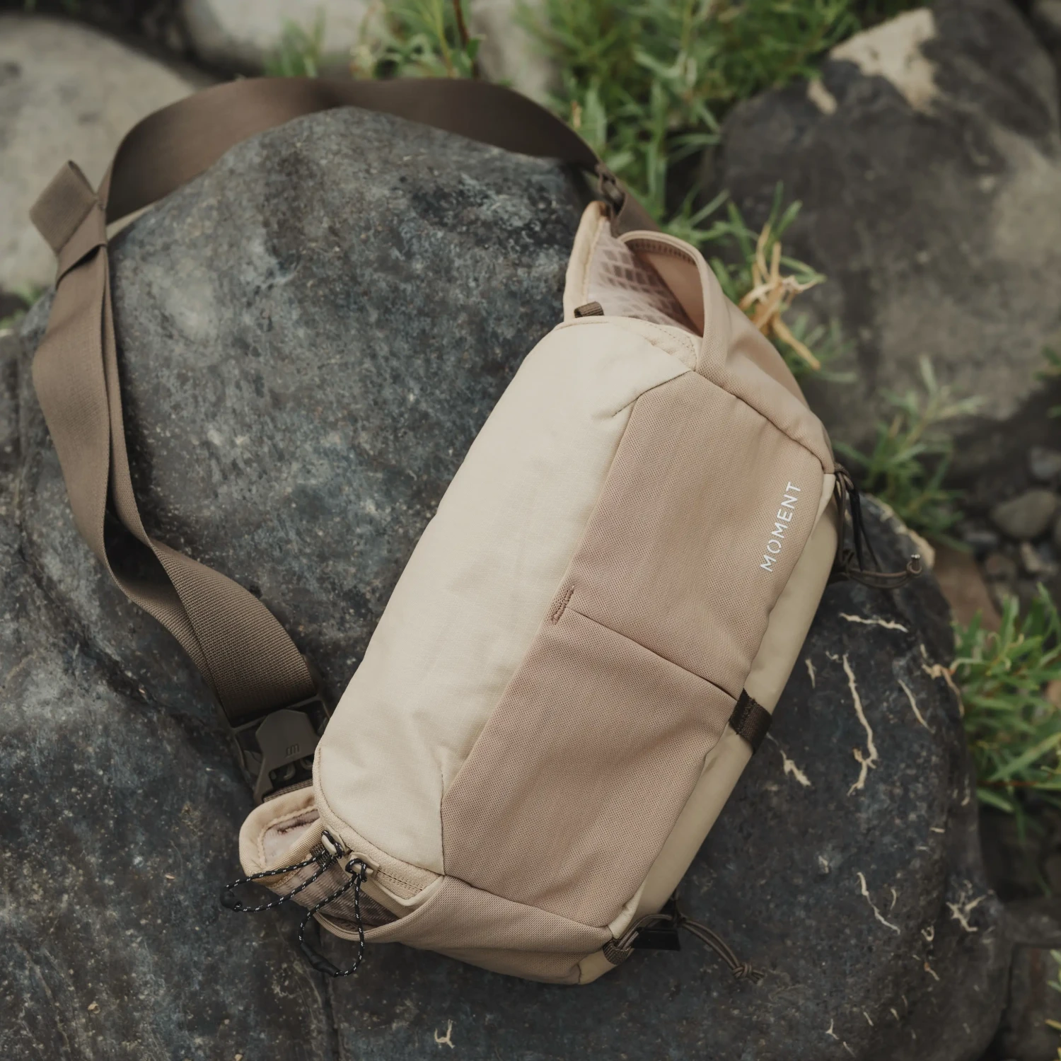 Moment Slate Sling 4L Desert in use outdoors