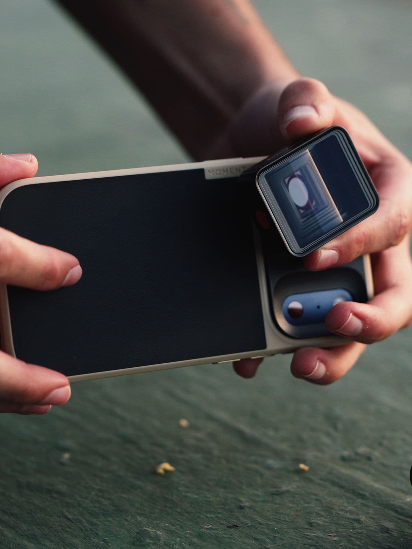 Moment Anamorphic II lens in hand