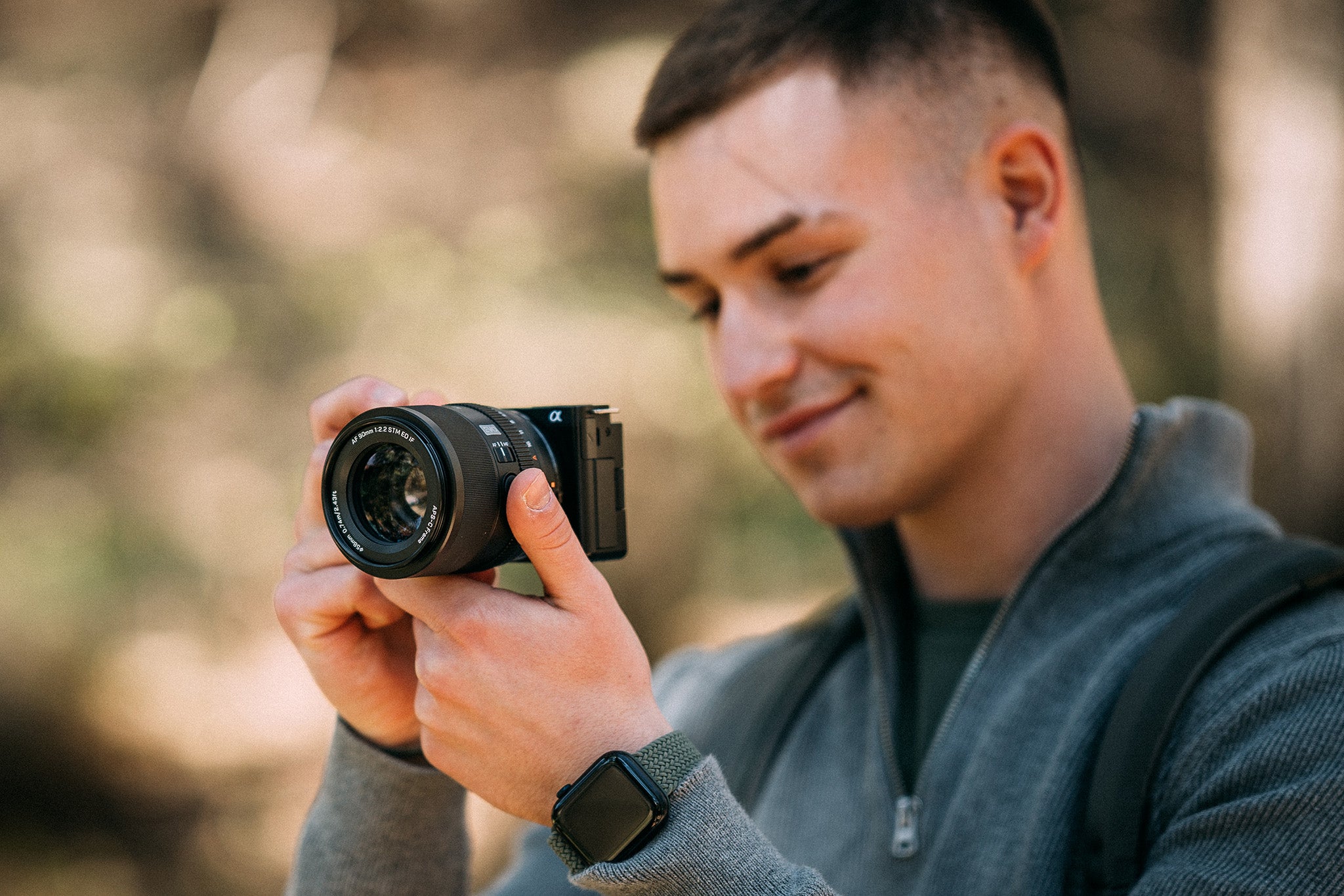 Compact Viltrox AF 90mm F2.2 Z held in hand