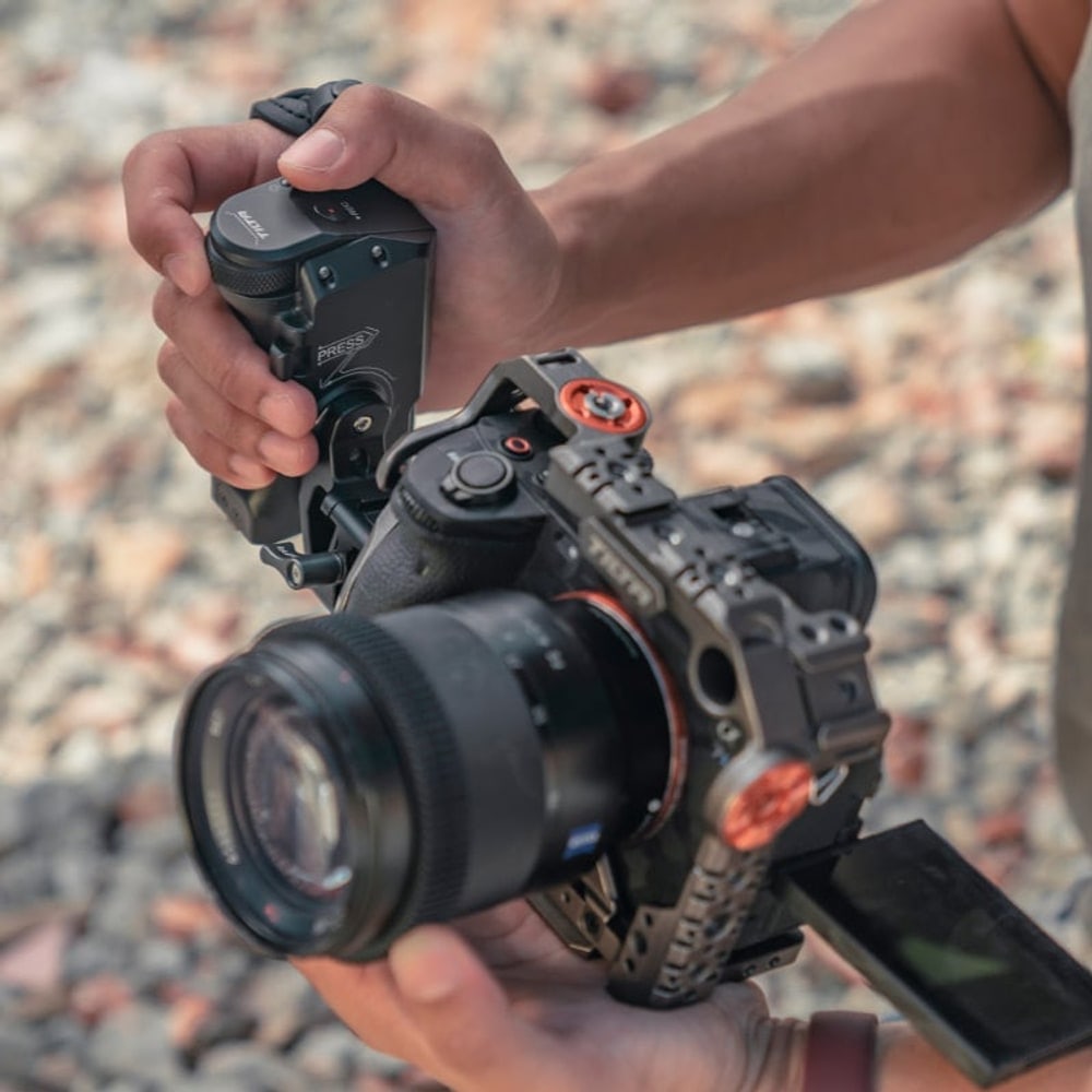 Ergonomic grip and wrist strap