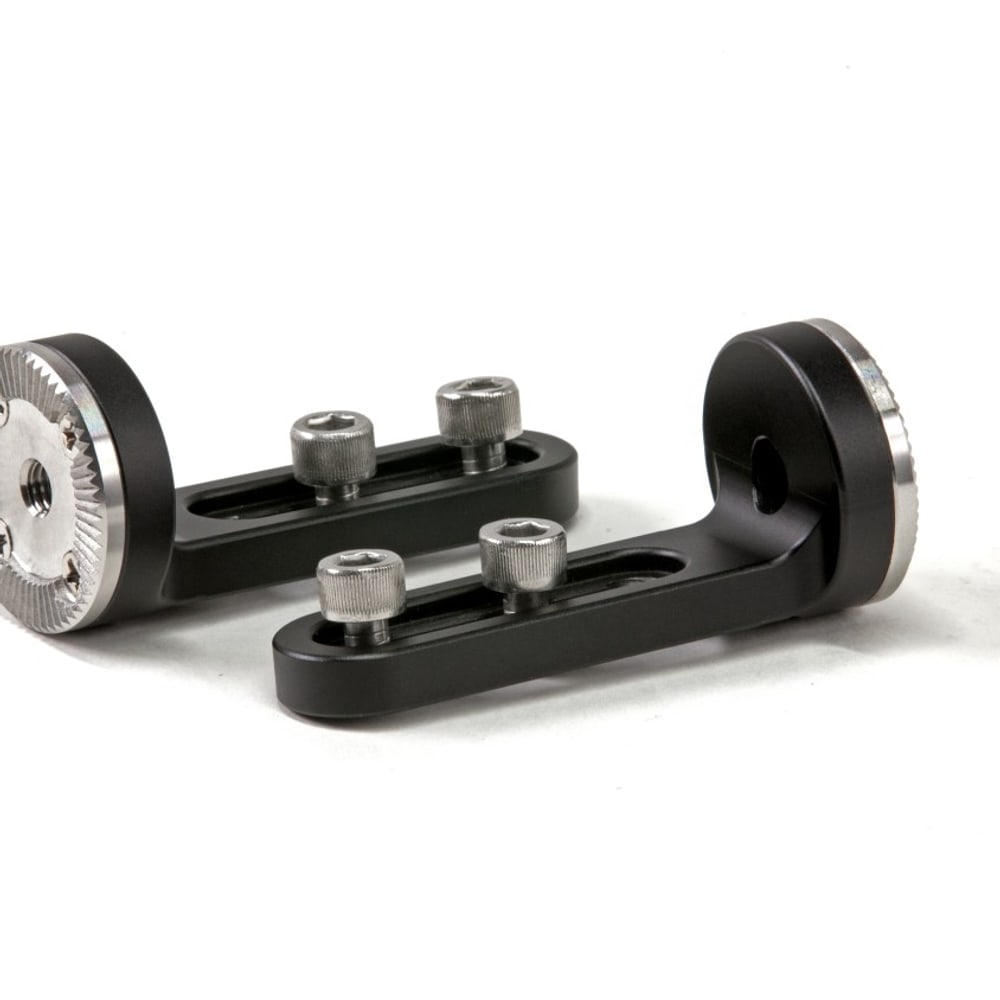 Two 1/4-20 screws in the slot, rosette at the end