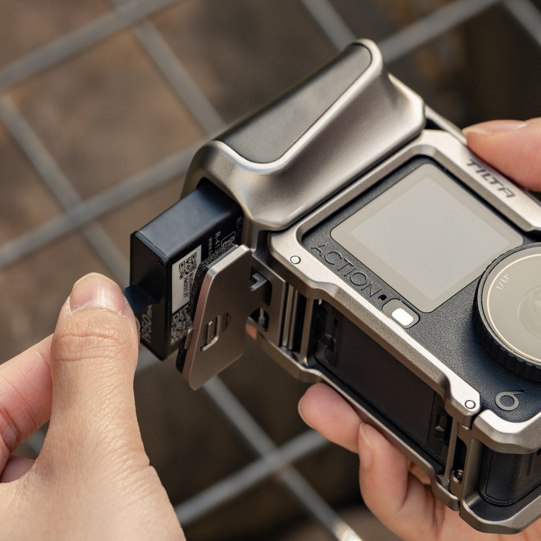 A spare battery lives inside the handle