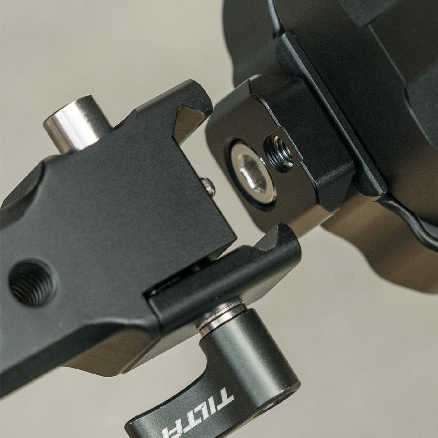Dovetail attachment with a locating pin