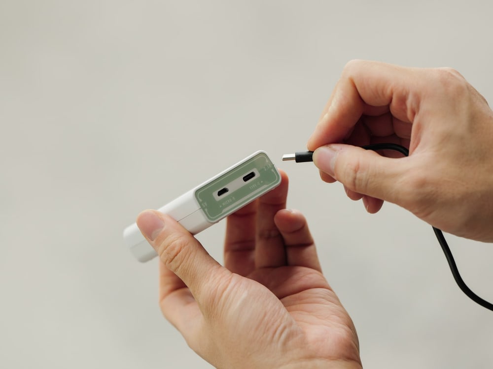 Charges from any USB source
