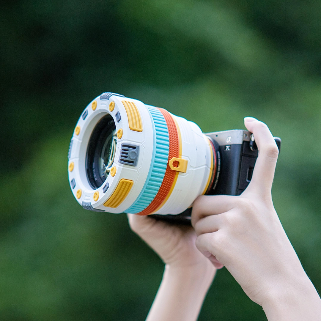 The lens wearing a printed DIY armor skin